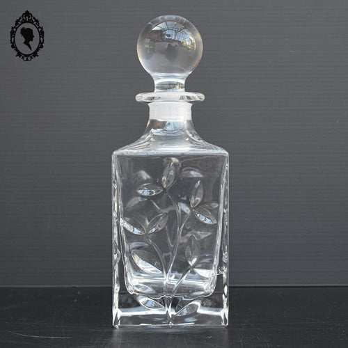 Belle carafe motif végétal en cristal avec bouchon rond vintage