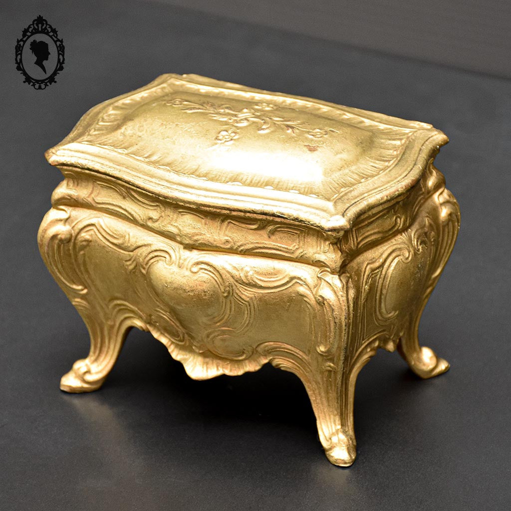 Boite ou coffret à bijoux métal forme commode bombée dorée ancienne