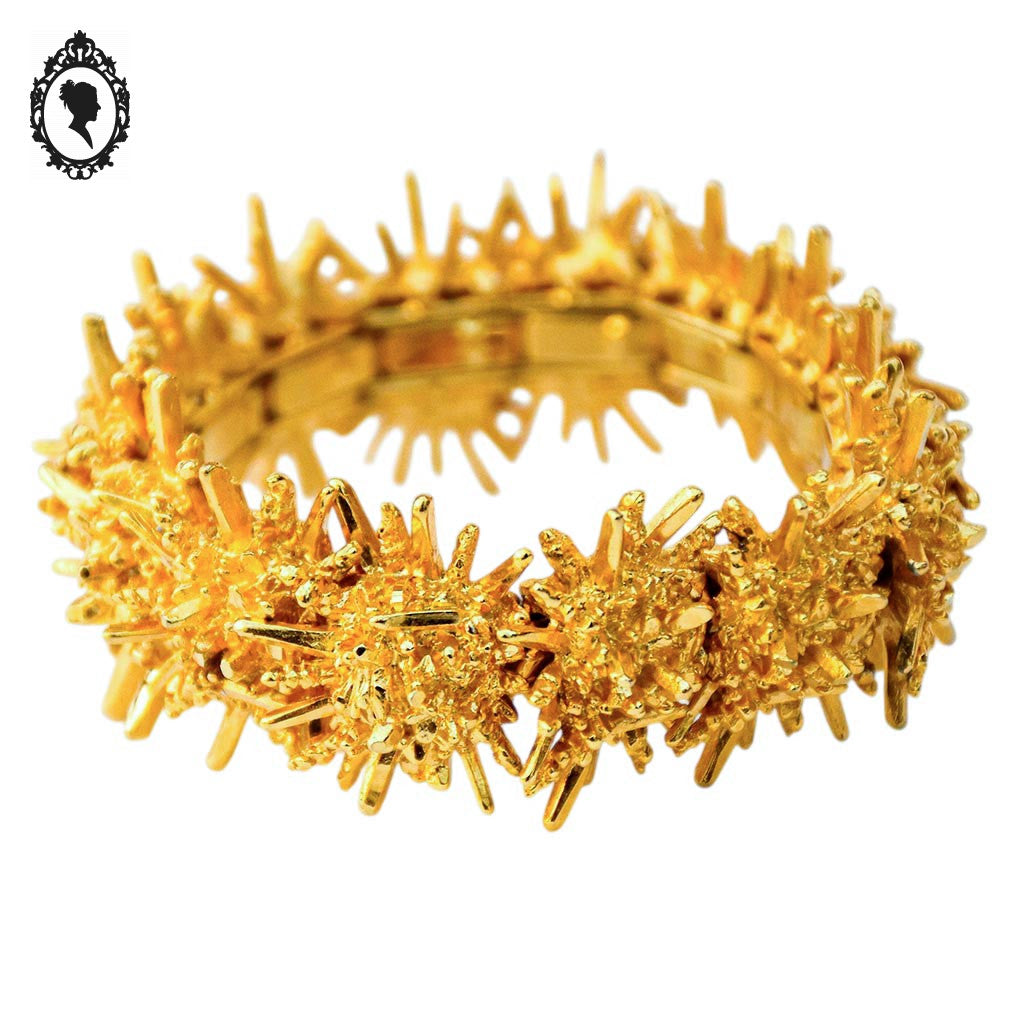 Bracelet jonc manchette articulé soleil doré Boucher vintage