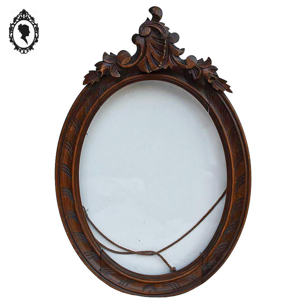 Cadre ovale en bois sculpté massif fronton arabesques + vitre verre
