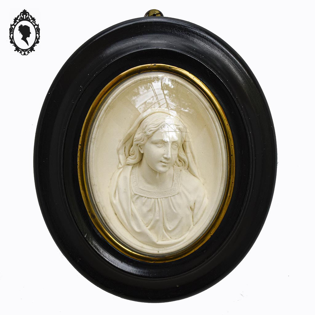 Cadre ovale noir verre bombé avec le buste de la vierge Marie reliquaire ancien