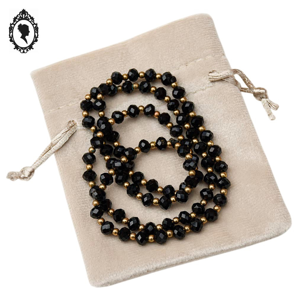 Élégant long collier fin perles de verre facetté noir et doré vintage ancien