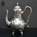Élégante théière métal argenté décor arabesque ancienne