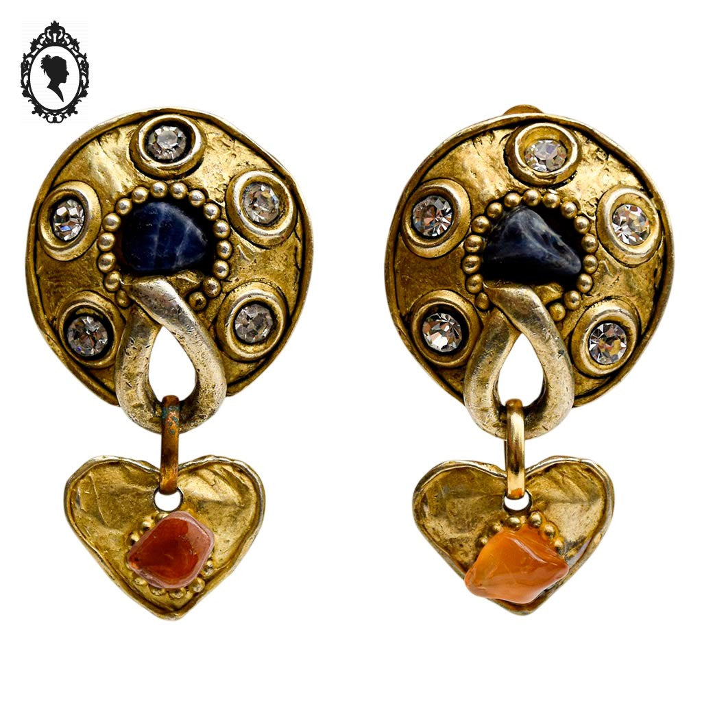Grosses boucles d’oreilles clips dorées signées Claire Dévé bijou vintage