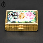 Jolie boite à pilules émaux polychromes et doré vintage