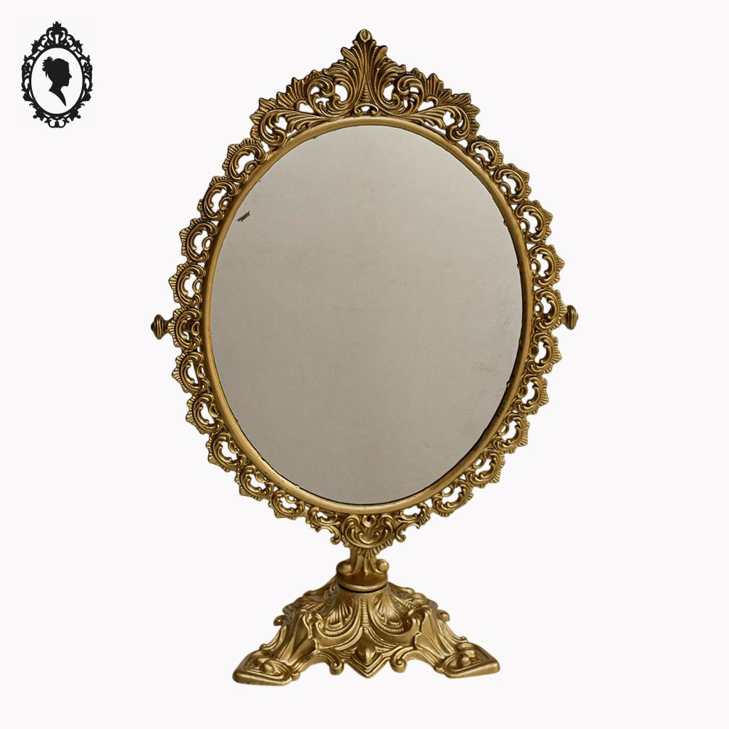 Psyché miroir doré ovale pivotant à poser sur pied H 50 cm rocaille arabesque
