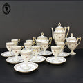 Service 10 tasses à café pot théière sucrier porcelaine U C Limoges piédouche blanc fleuri doré ancien style Empire époque art déco