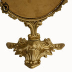 Psyché miroir doré ovale pivotant à poser sur pied H 50 cm rocaille arabesque