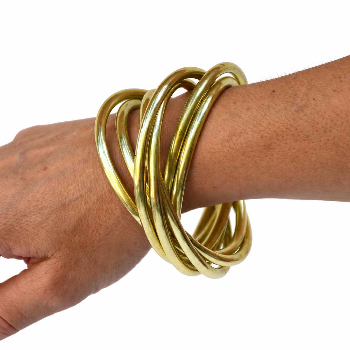Bracelet vintage à 7 joncs entrelacés en laiton doré