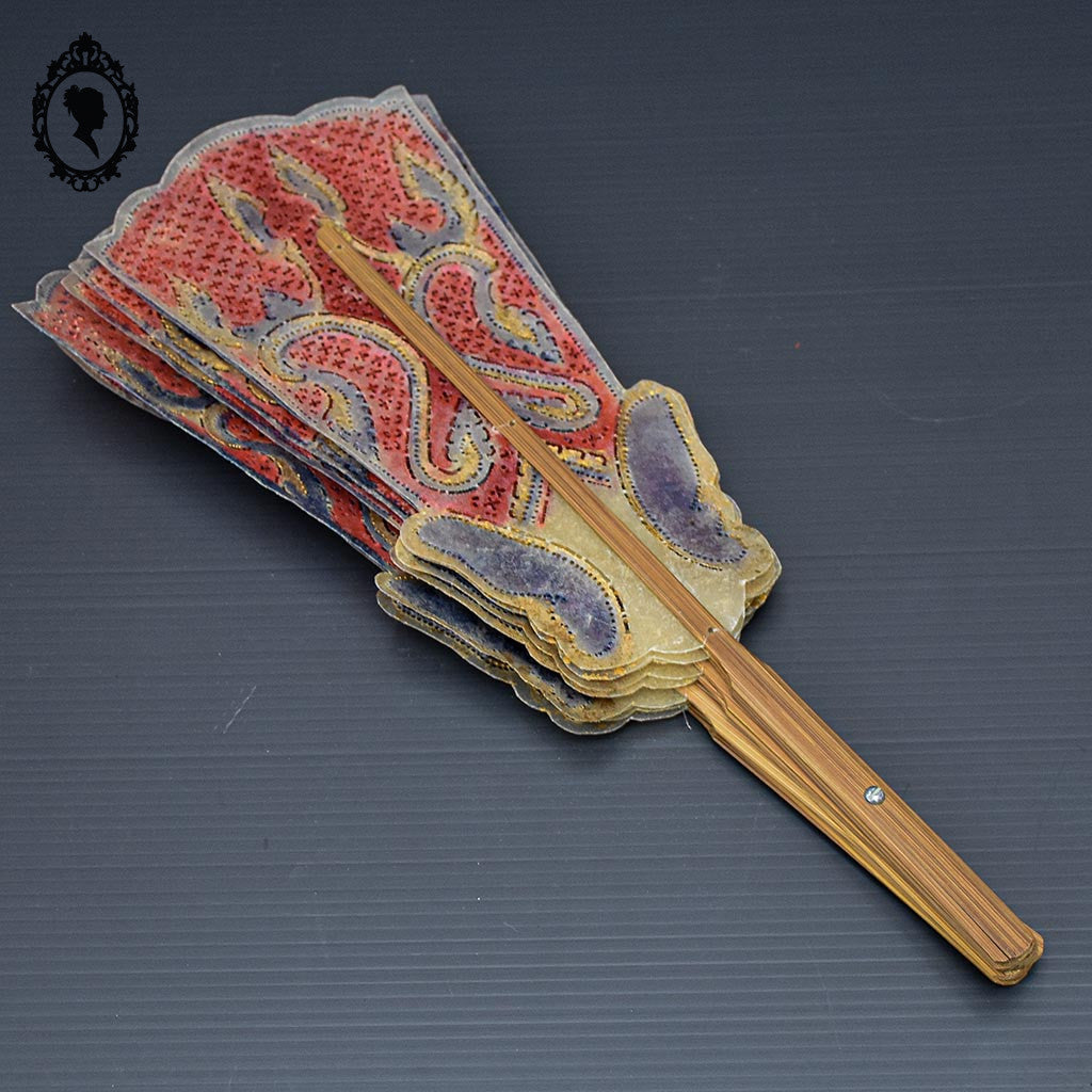 Éventail en peau ajourée violet rouge bois bambou indonésien vintage