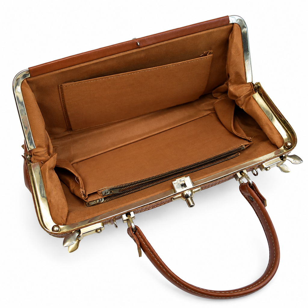Sac à main vintage en cuir cognac à fermoir métallique et poches frontales