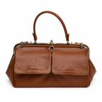 Sac à main vintage en cuir cognac à fermoir métallique et poches frontales