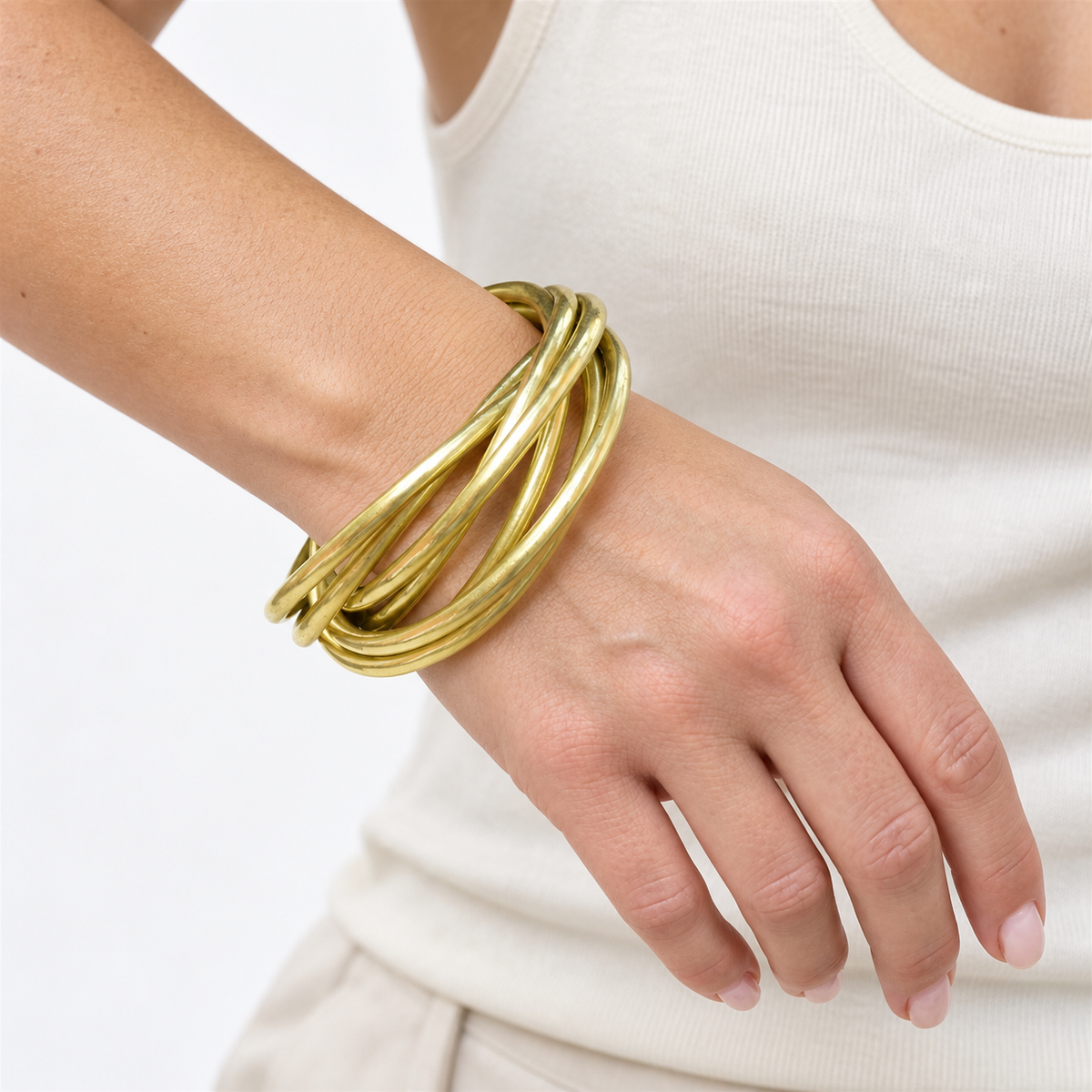 Bracelet vintage à 7 joncs entrelacés en laiton doré