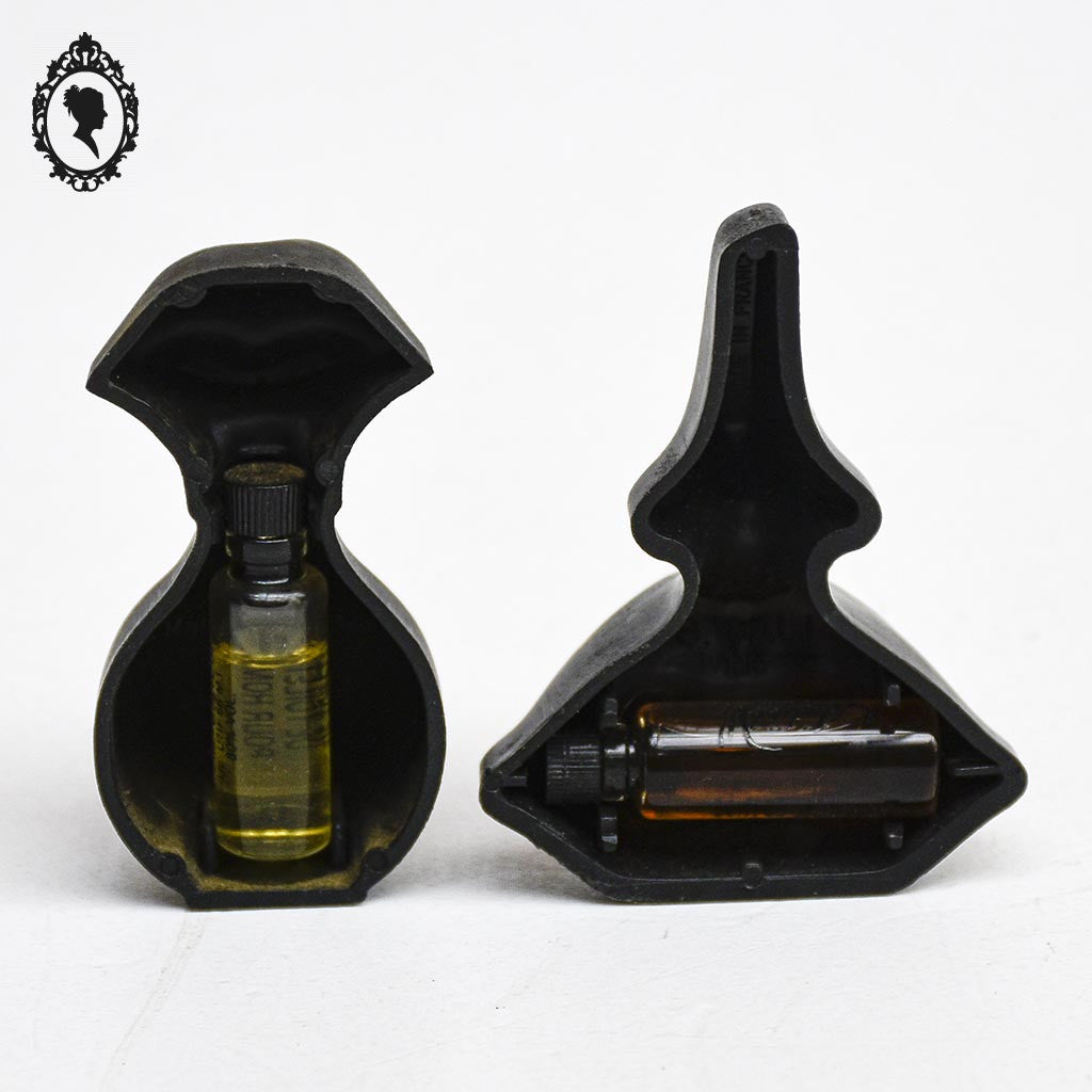 2 tubes de parfum de Salvador Dali bouche noire