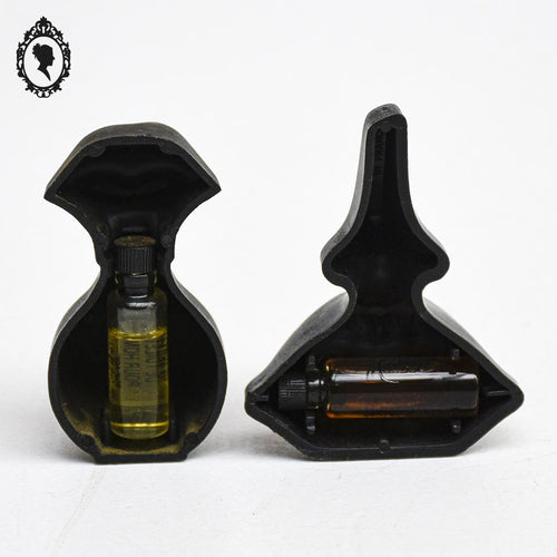 2 tubes de parfum de Salvador Dali bouche noire