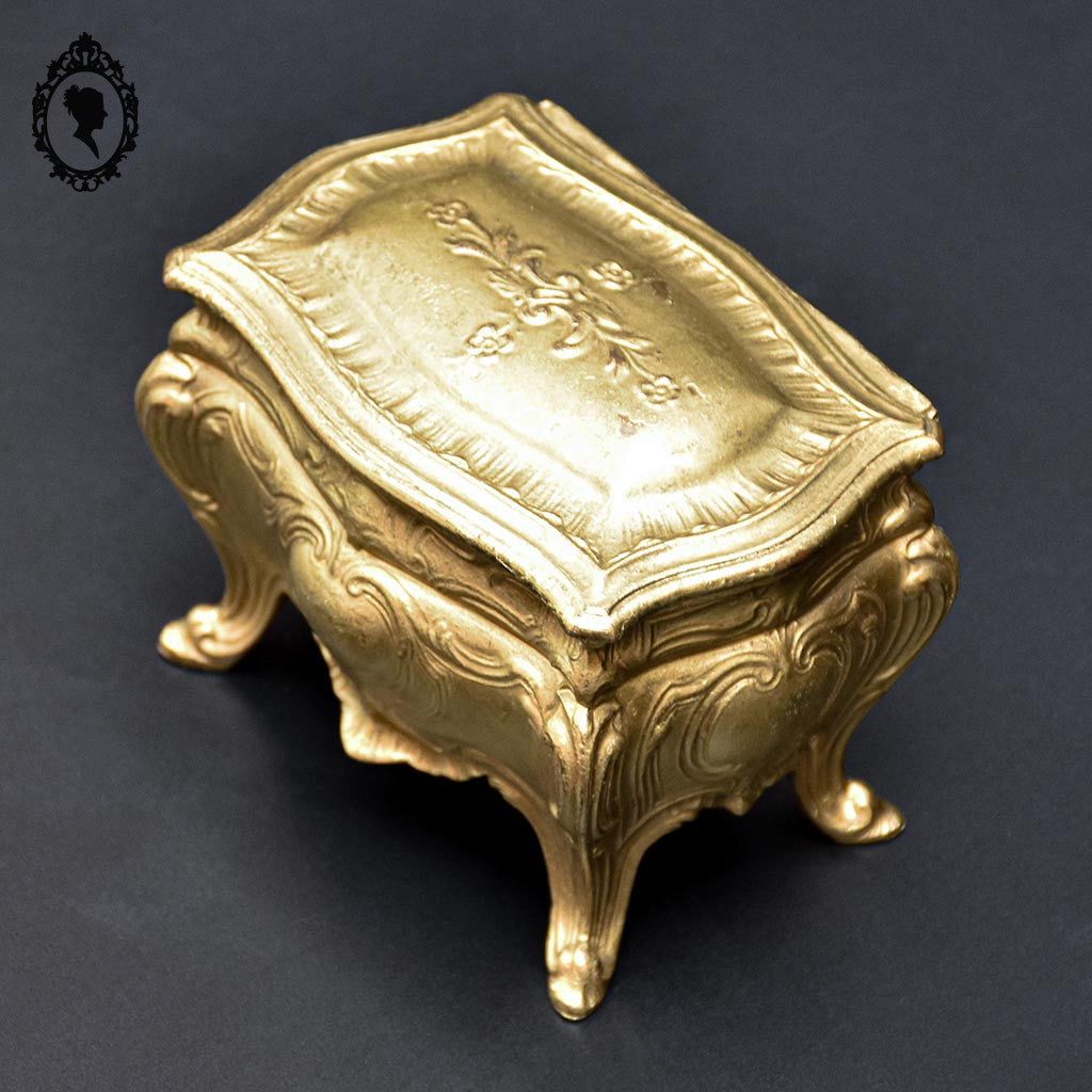 Boite ou coffret à bijoux métal forme commode bombée dorée ancienne