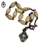 Bracelet dizainier chapelet perles de nacre grain de riz médaille Ste Bernadette ancien