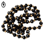 Élégant long collier fin perles de verre facetté noir et doré vintage ancien