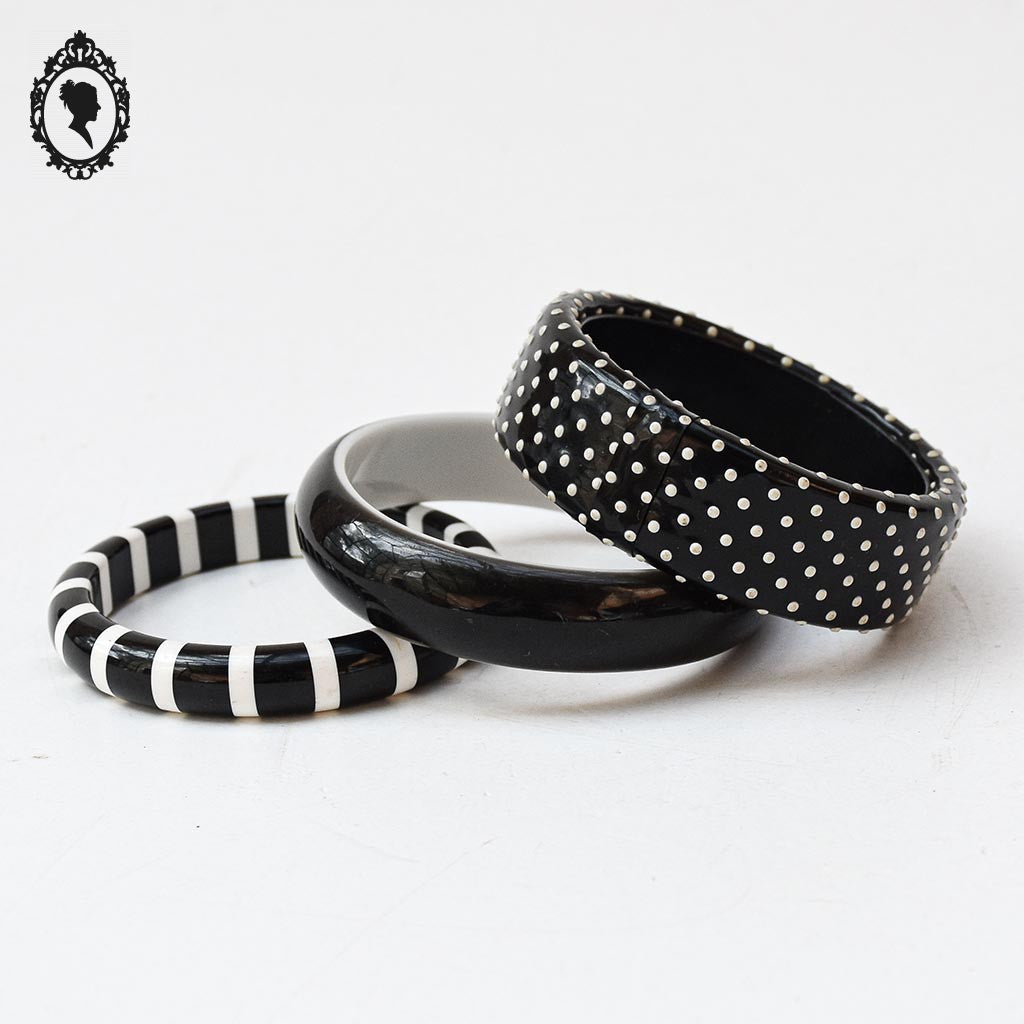 Ensemble de 3 bracelets rigides joncs noir et blanc vintages