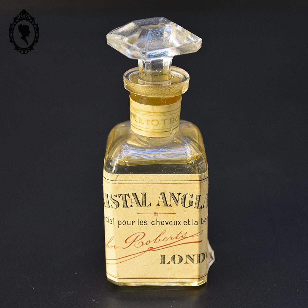 Flacon ancien collection en cristal héliotrope Anglais London pour cheveux et barbe
