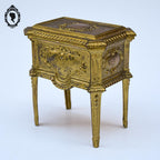 Jolie boite ou coffret à bijoux régule doré forme commode ancienne