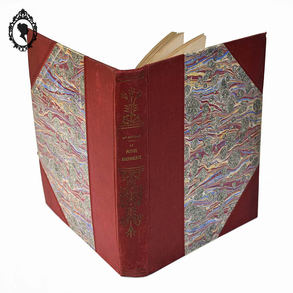 Livre charmant ancien La petite doctoresse Nelly rouge de prix en 1915
