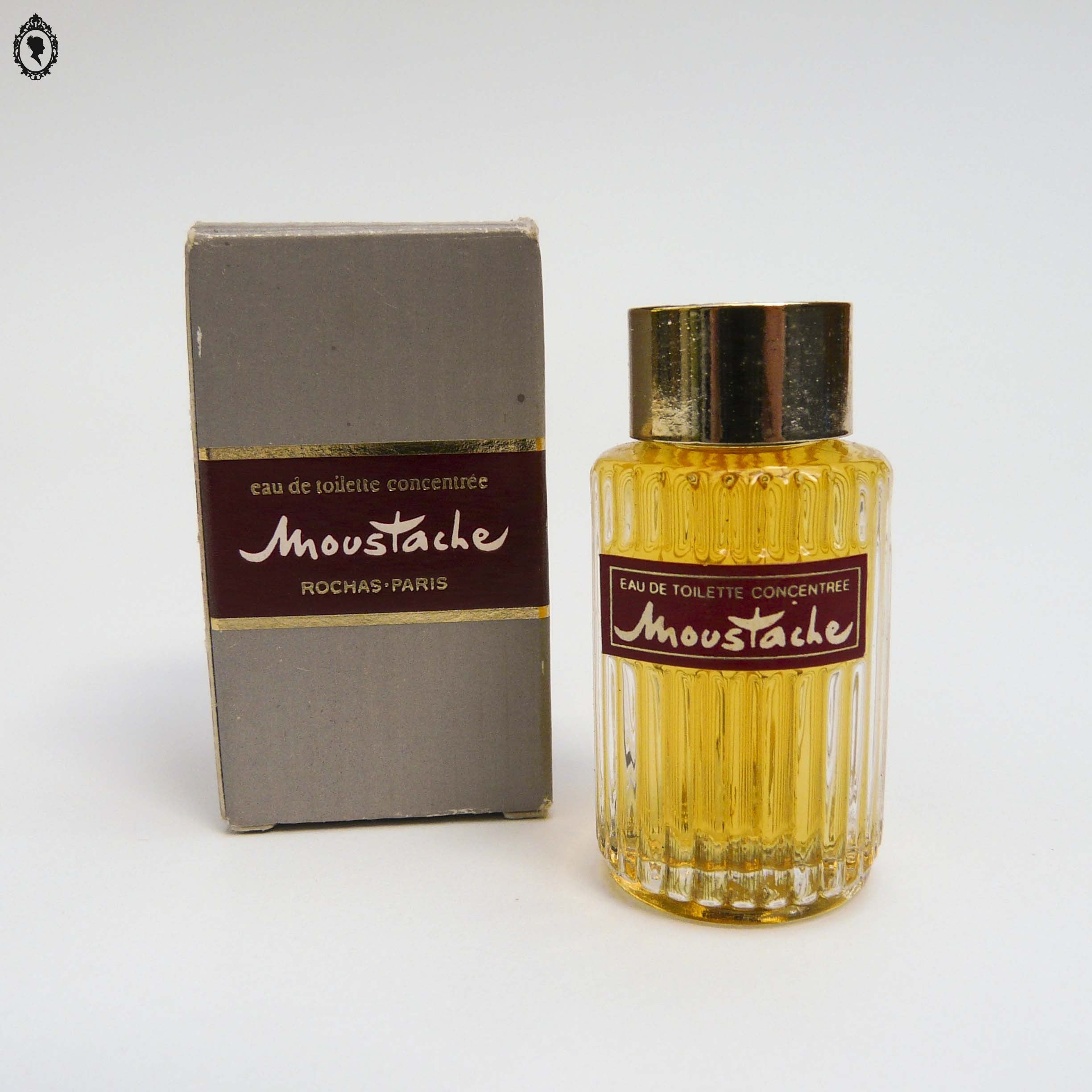 Miniature de parfum Moustache de Rochas Edt concentrée boite grise 8,5 ml Ancienne de collection