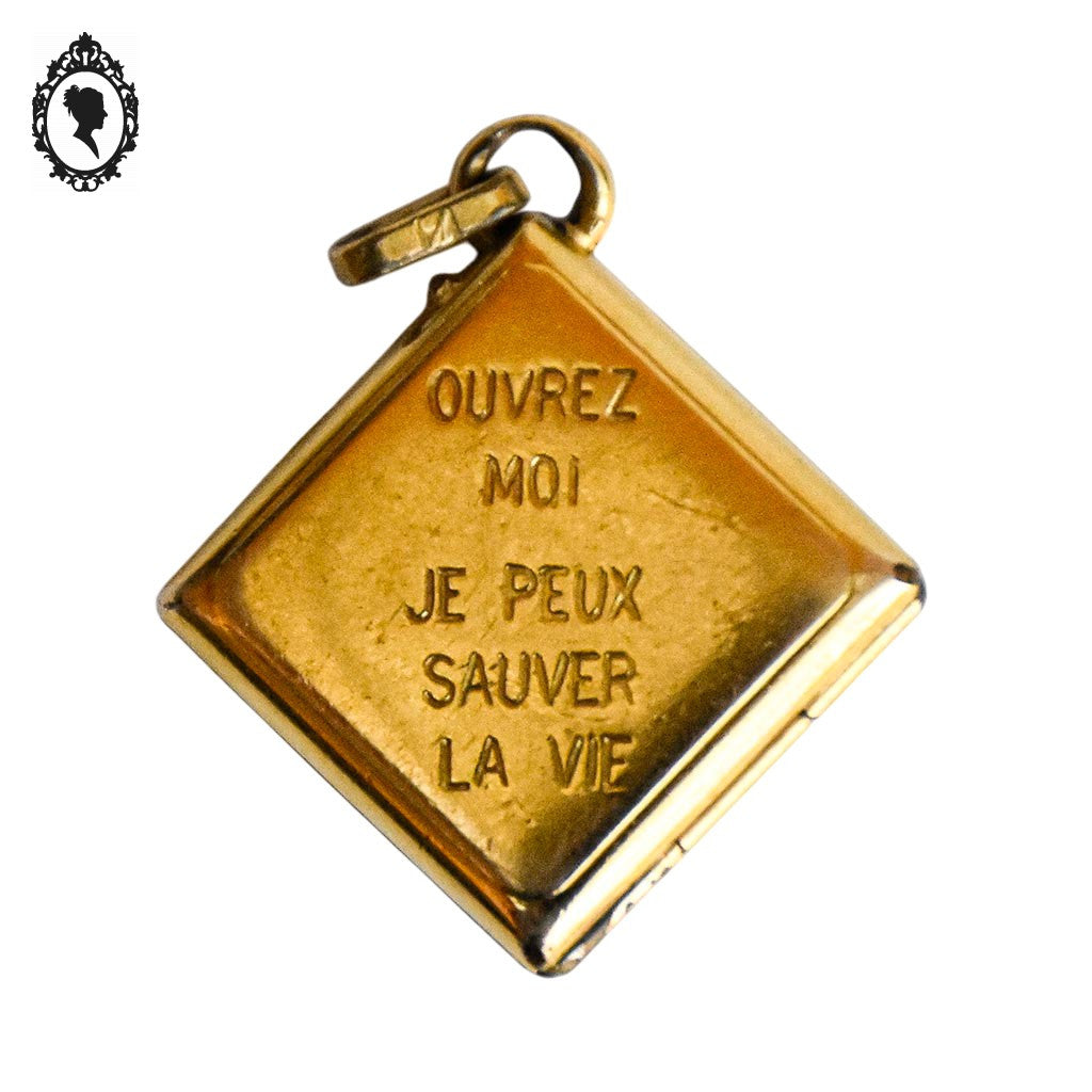 Pendentif croix points cardinaux Nord Ouest Est Sud qui s’ouvre porte photo relique vermeil pierre noire bijou vintage ancien