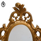 Petit miroir glace cadre ovale mural doré fronton arabesque baroque H 35 cm vintage