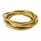 Bracelet vintage à 7 joncs entrelacés en laiton doré