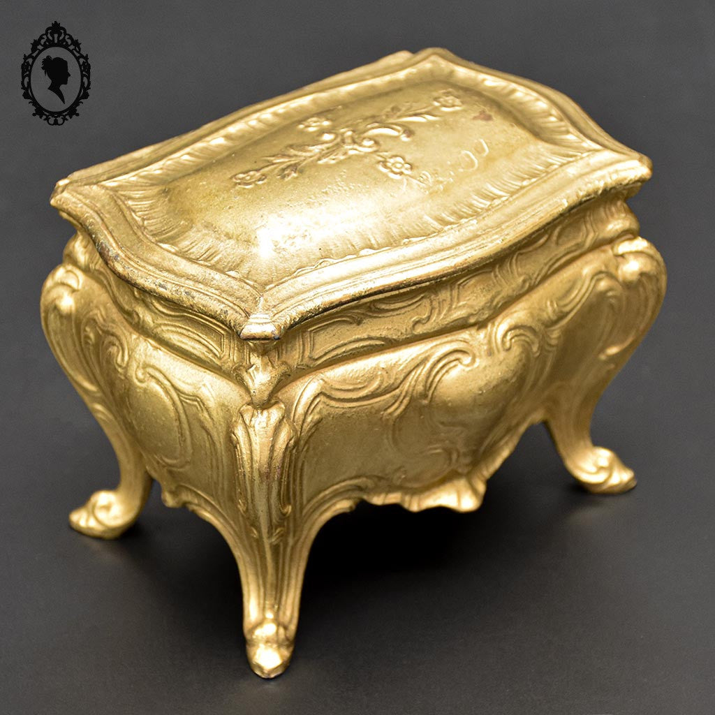 Boite ou coffret à bijoux métal forme commode bombée dorée ancienne