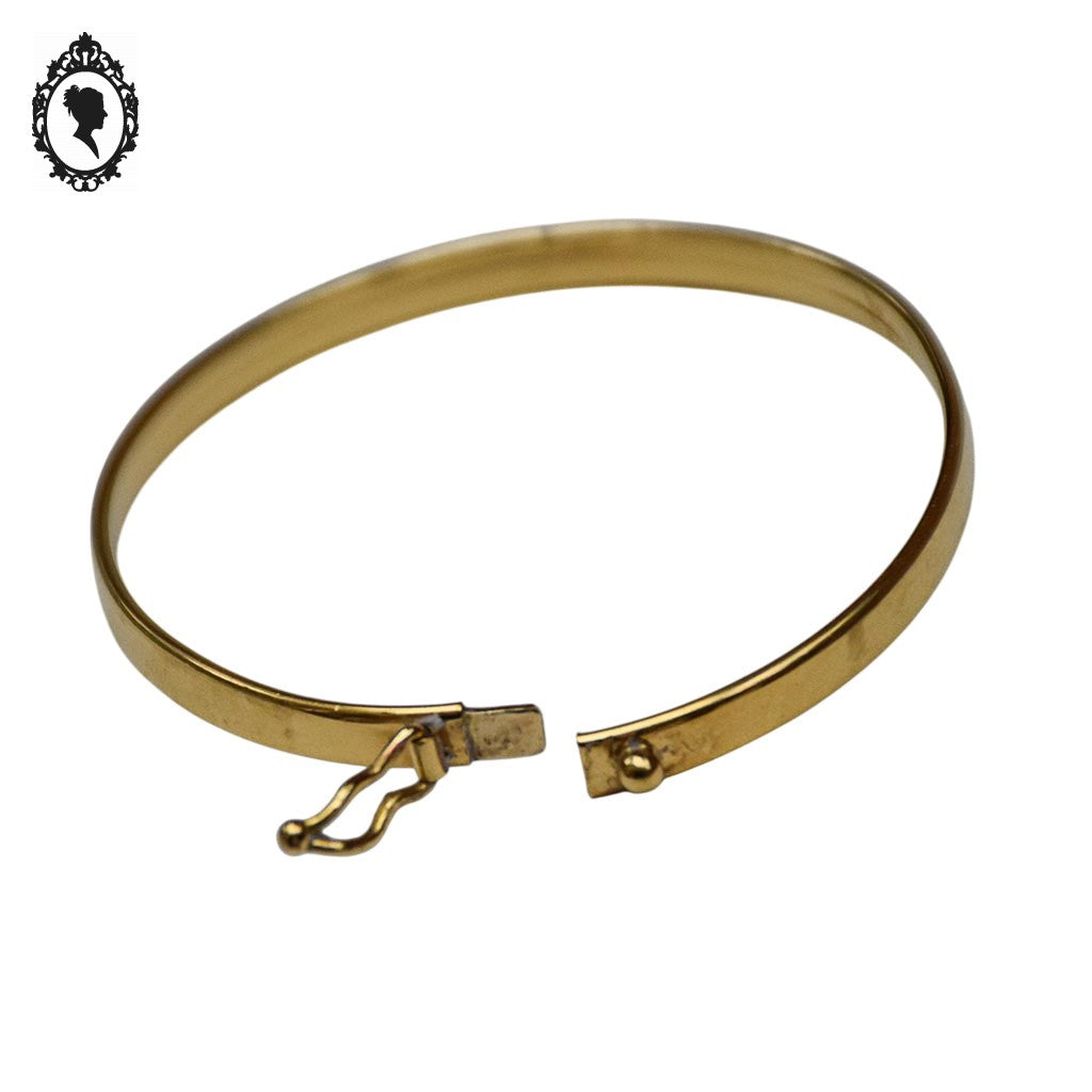 Bracelet bébé enfant jonc ovale ouvrant en or jaune avec poinçons