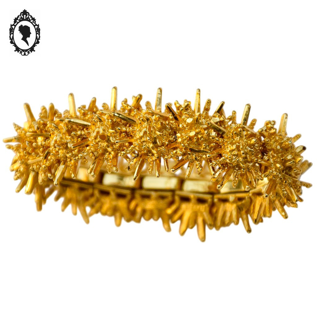 Bracelet jonc manchette articulé soleil doré Boucher vintage