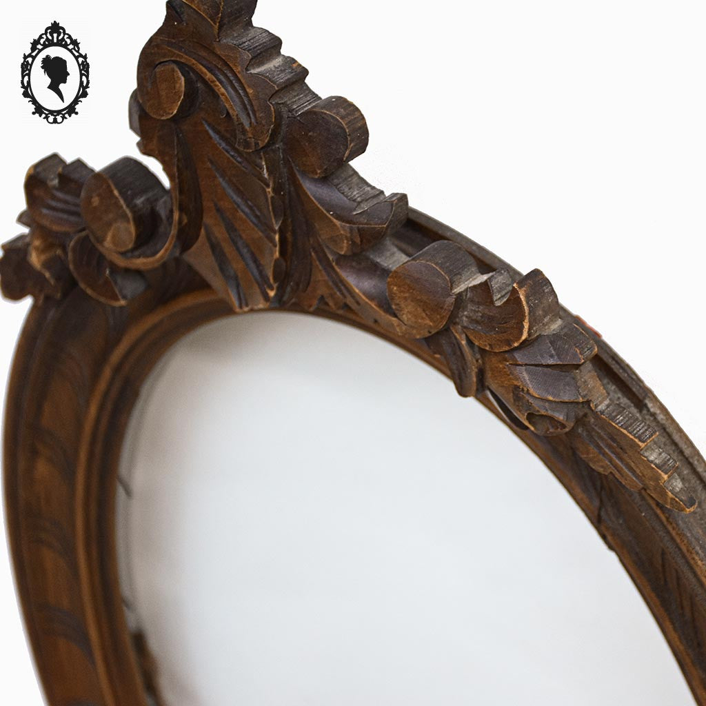 Cadre ovale en bois sculpté massif fronton arabesques + vitre verre