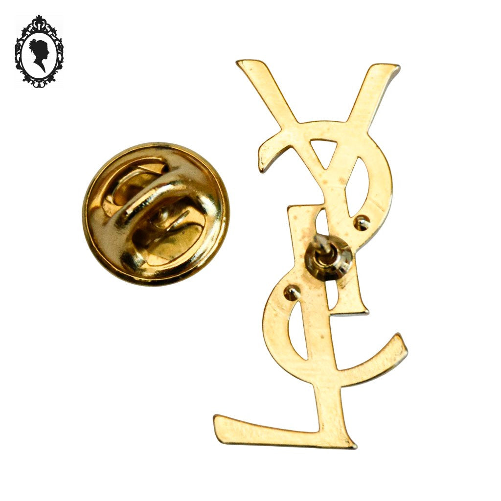 Chic broche pin’s logo initiales YSL d’Yves Saint Laurent Paris bijou doré vintage