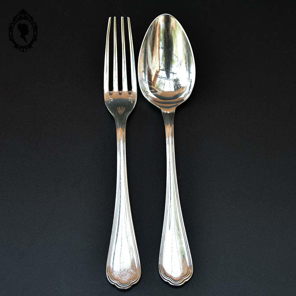 Ensemble 2 couverts enfant ou dessert Chritofle métal argenté dans écrin