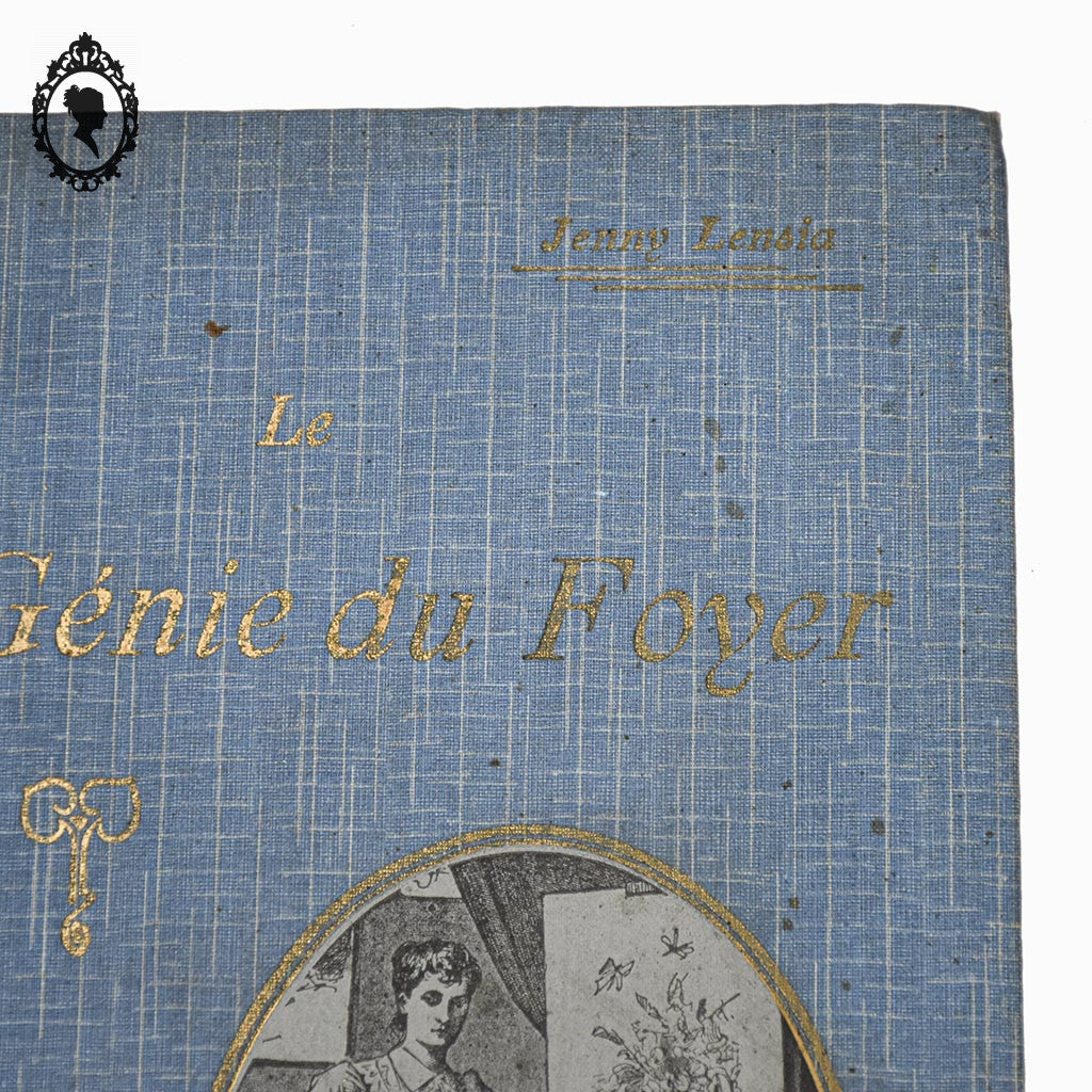 Livre bleu ancien Le Génie du Foyer de Jenny Lensia 1913