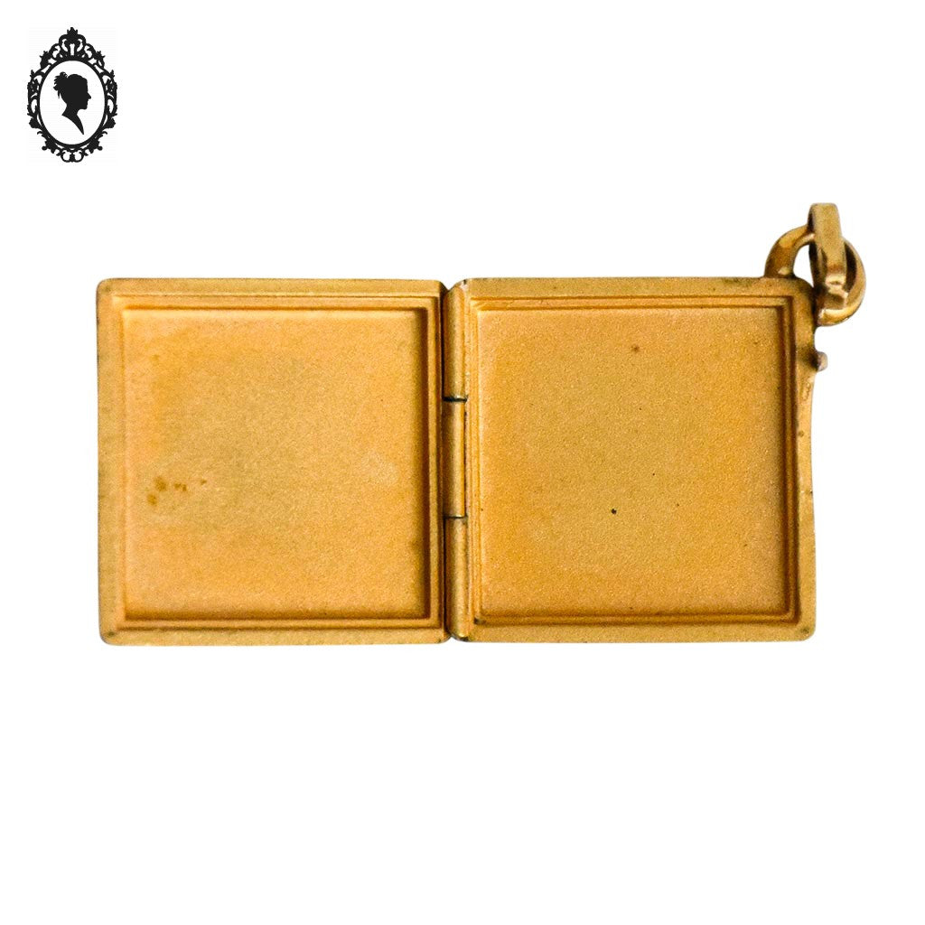 Pendentif croix points cardinaux Nord Ouest Est Sud qui s’ouvre porte photo relique vermeil pierre noire bijou vintage ancien