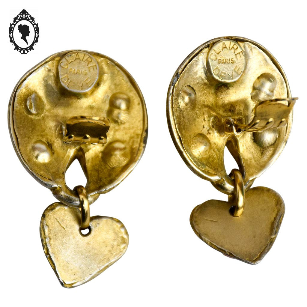 Grosses boucles d’oreilles clips dorées signées Claire Dévé bijou vintage