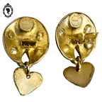 Grosses boucles d’oreilles clips dorées signées Claire Dévé bijou vintage
