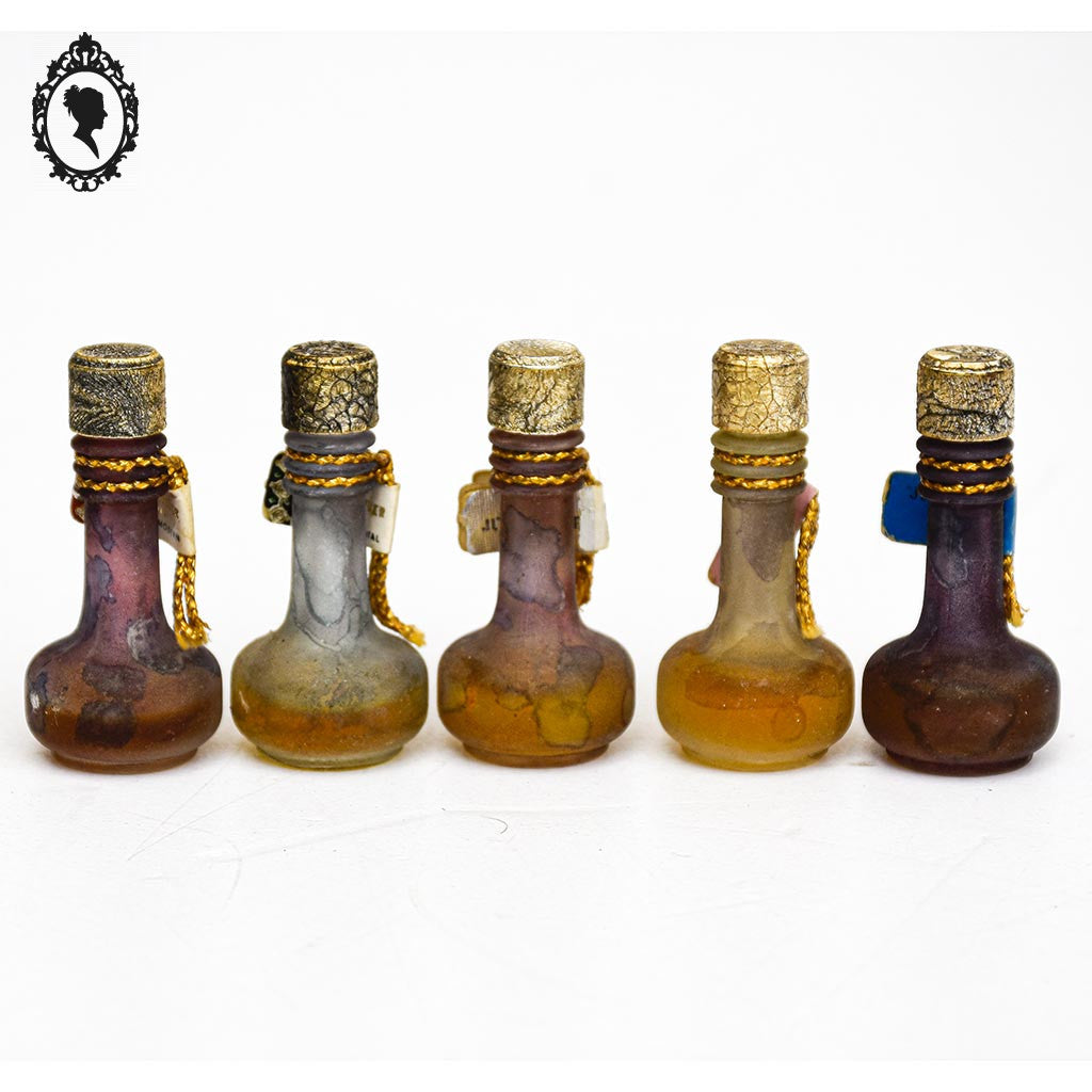 Lot 5 miniatures vintages anciennes de parfum Judith Muller