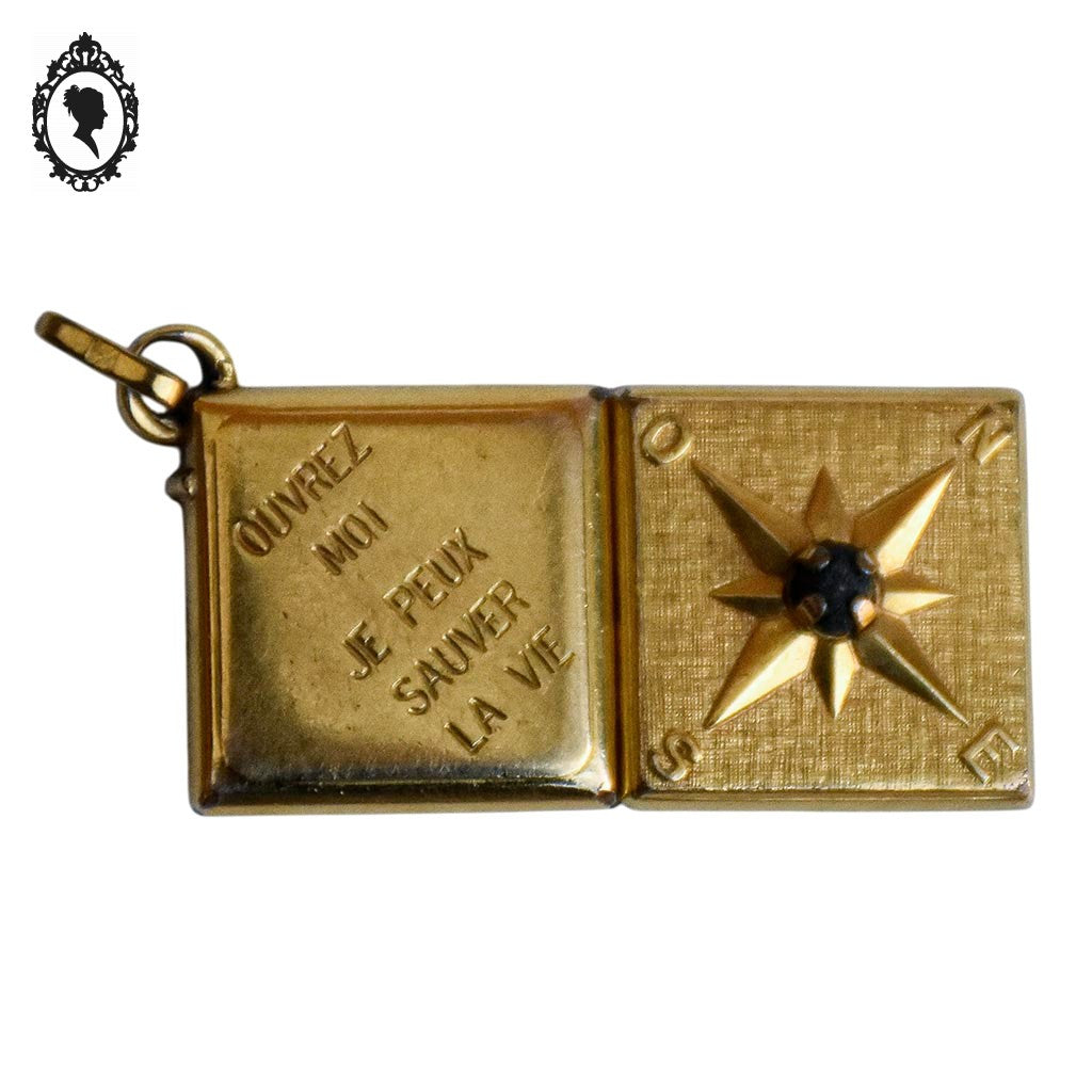 Pendentif croix points cardinaux Nord Ouest Est Sud qui s’ouvre porte photo relique vermeil pierre noire bijou vintage ancien