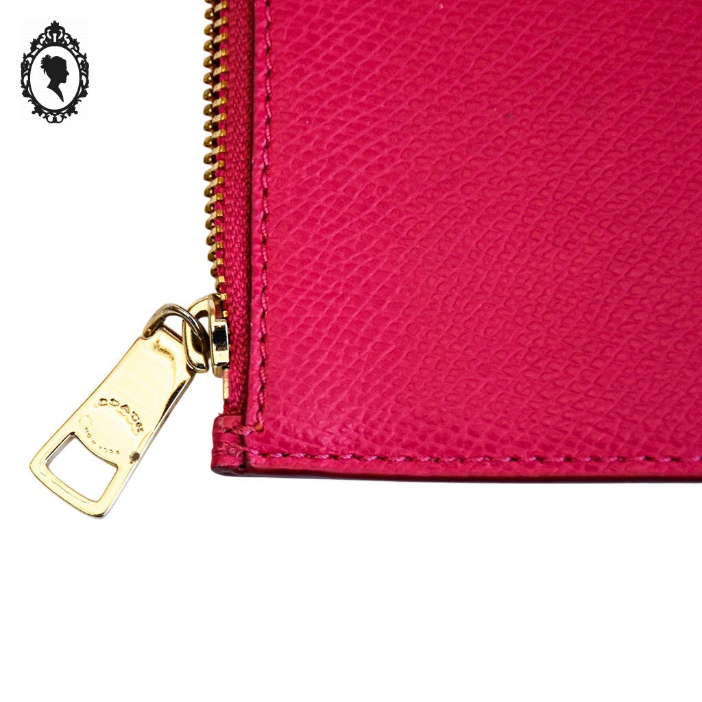 Pochette Coach rose fuchsia cuir grainé 20,8 x 11,5 cm femme New York