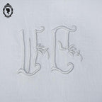 Service nappe et 12 serviettes de table anciennes damassées blanches monogramme JM ou WC