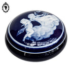 Bonbonnière signée Tharaud Limoges boîte porcelaine bleue anges blancs