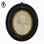 Cadre ovale noir verre bombé avec le buste de la vierge Marie reliquaire ancien