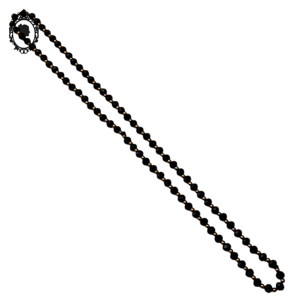 Élégant long collier fin perles de verre facetté noir et doré vintage ancien