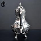Élégante théière métal argenté décor arabesque ancienne