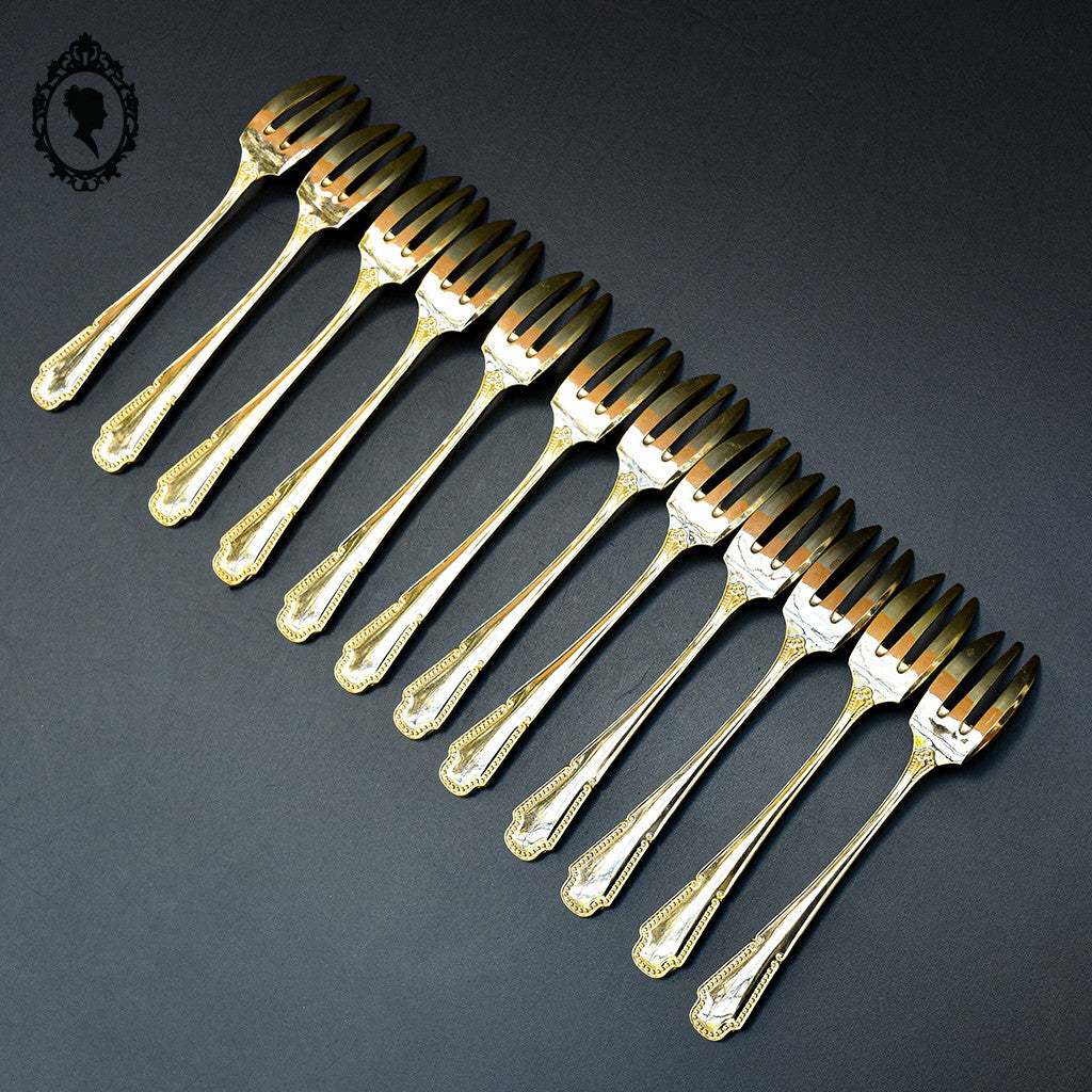 Lot 12 couverts petites fourchettes métal or doré rang de perles vintage