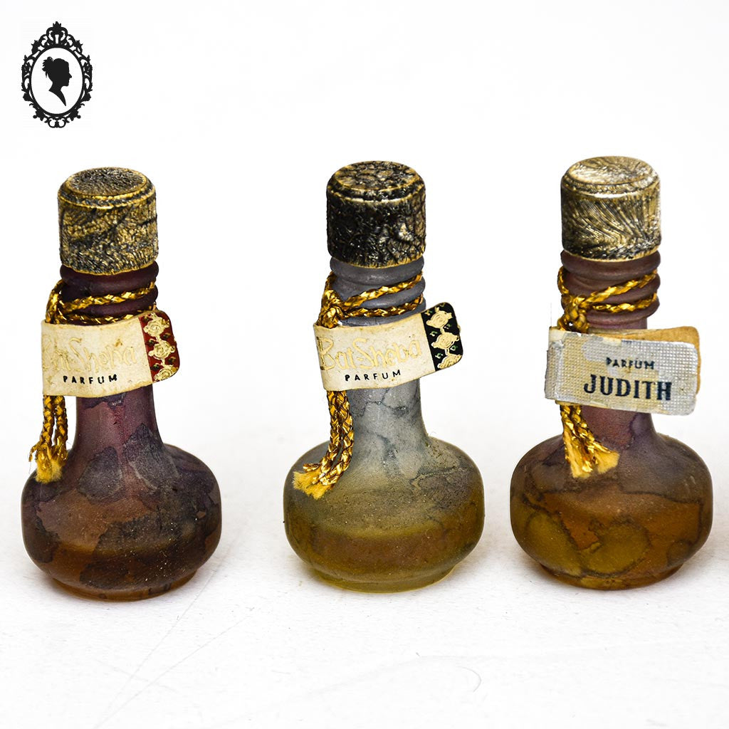 Lot 5 miniatures vintages anciennes de parfum Judith Muller